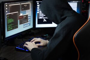 cyber security hack business financial man person unrecognizable criminal thief pc electronics screen t20 zLxj8n